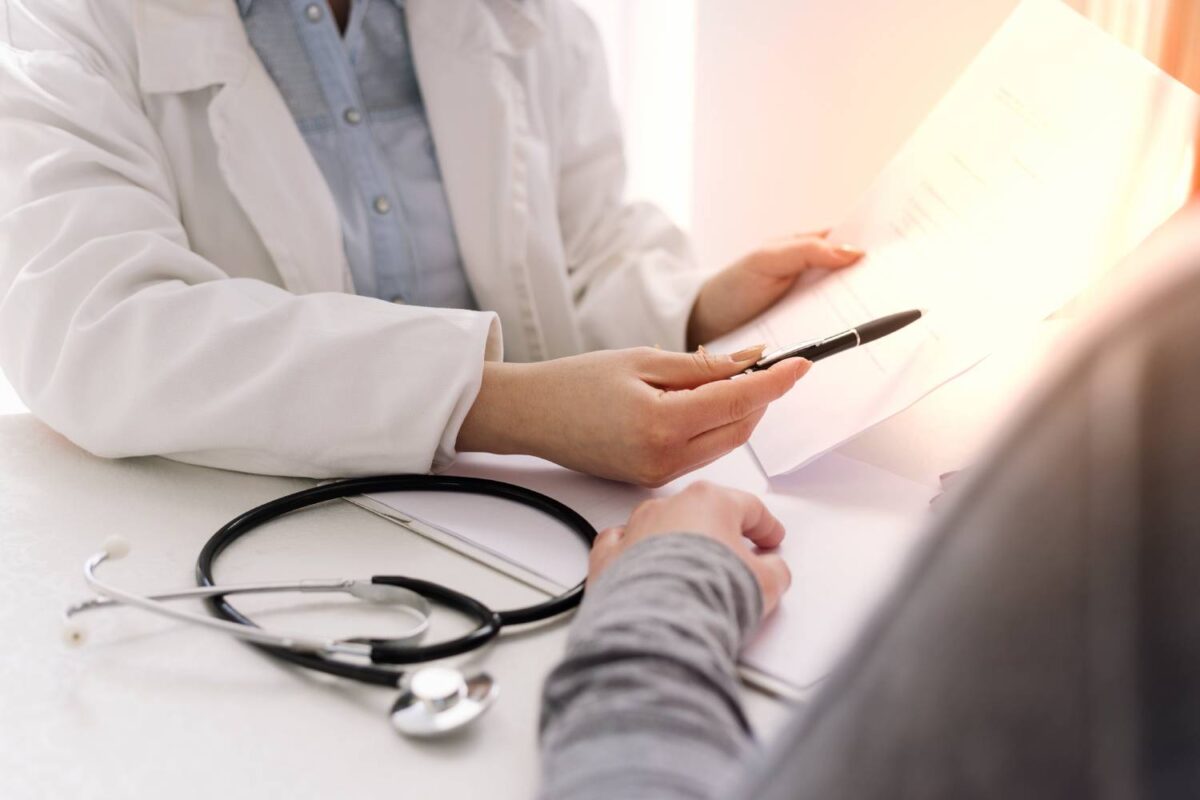 Doctor and patient are discussing about diagnosis